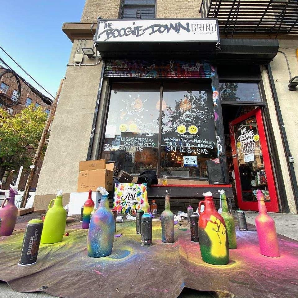 Store front adorned with colorful jars and bottles at Boogie Down Grind